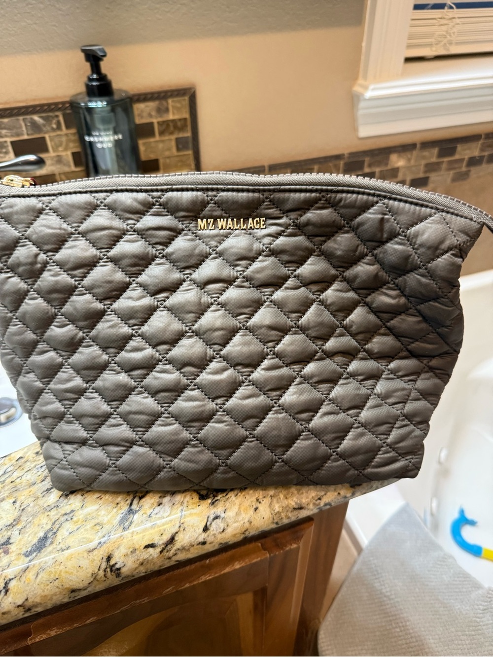 MZ WALLACE Quilted Nylon Cosmetic Pouch in Taupe Gray with Gold Logo
